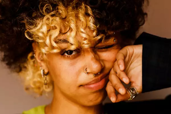 Nxdia pulls a face at the camera