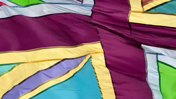 A Union Jack flag made of purples, blues and greens – instead of the usual colours