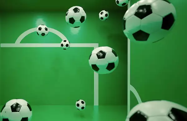 Multiple floating soccer balls inside a green room with white goalpost markings on the walls. The perspective and reflections create an illusion of depth, making it appear as if the balls are suspended in mid-air.