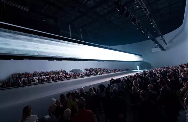 The audience watching the Free Your Mind stage lit up with white lighting