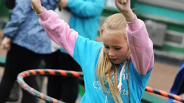 Photo of a child using a hula hoop