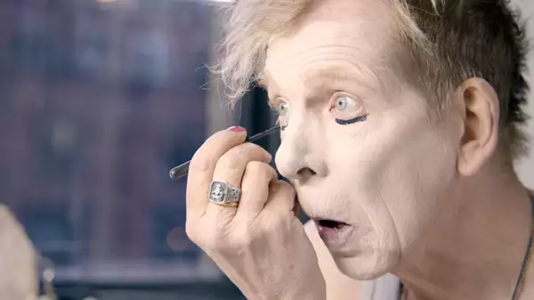 The artist David Hoyle applying makeup