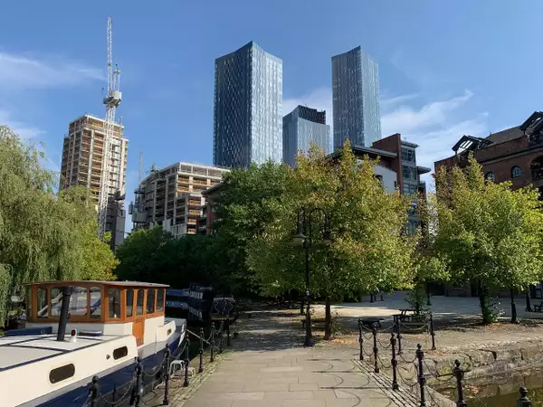 Photograph of a Manchester canal and skyscrapers
